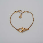 Carica l'immagine nel visualizzatore di Gallery, Vista generale del Bracciale Infinito in ottone placcato in oro 18 carati della Collezione Flavia.
