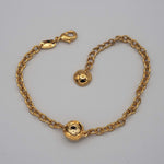 Carica l'immagine nel visualizzatore di Gallery, Bracciale Luna CACAO Jewels in ottone placcato in oro 18 carati con elemento a semisfera.
