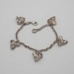 Carica l'immagine nel visualizzatore di Gallery, Bracciale Mille Baci CACAO Jewels in ottone placcato in palladio con cuori stropicciati.
