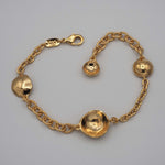 Carica l'immagine nel visualizzatore di Gallery, Bracciale Pianeti CACAO Jewels in ottone placcato in oro 18 carati con elementi concavi e convessi.
