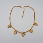 Carica l'immagine nel visualizzatore di Gallery, Collana Mille Baci CACAO Jewels in ottone placcato in oro 18 carati con cuori stropicciati.
