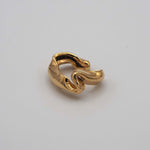 Carica l'immagine nel visualizzatore di Gallery, Vista laterale dell'Earcuff Neon CACAO Jewels in oro 18 carati.
