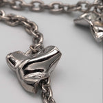 Carica l'immagine nel visualizzatore di Gallery, Dettaglio della lavorazione artigianale dei cuori stropicciati della Collana Mille Baci CACAO Jewels.
