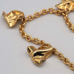 Carica l'immagine nel visualizzatore di Gallery, Particolare della sequenza di cuori stropicciati della Collana Mille Baci CACAO Jewels
